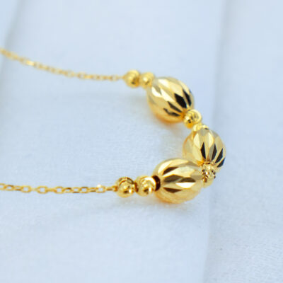 Golden Facet Bead Necklace