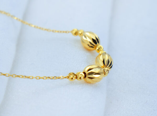 Golden Facet Bead Necklace